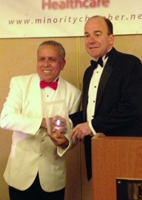 Doug Mayorga presents the award to Ron Fried