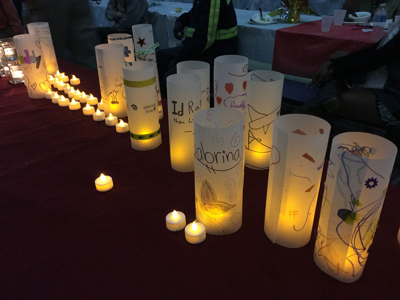 Dozens of smaller candles and several large candles, which the children decorated