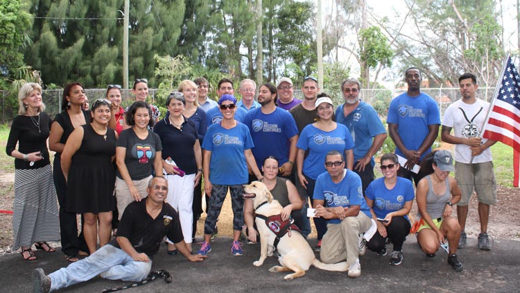 The team assembled at the cemetery