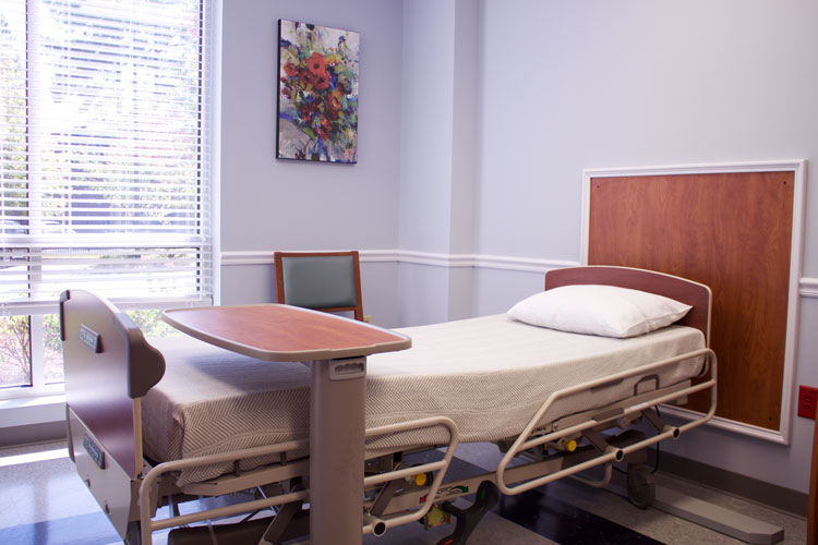 A bed in a patient room