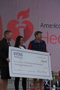 Presenting the check to the American Heart Association