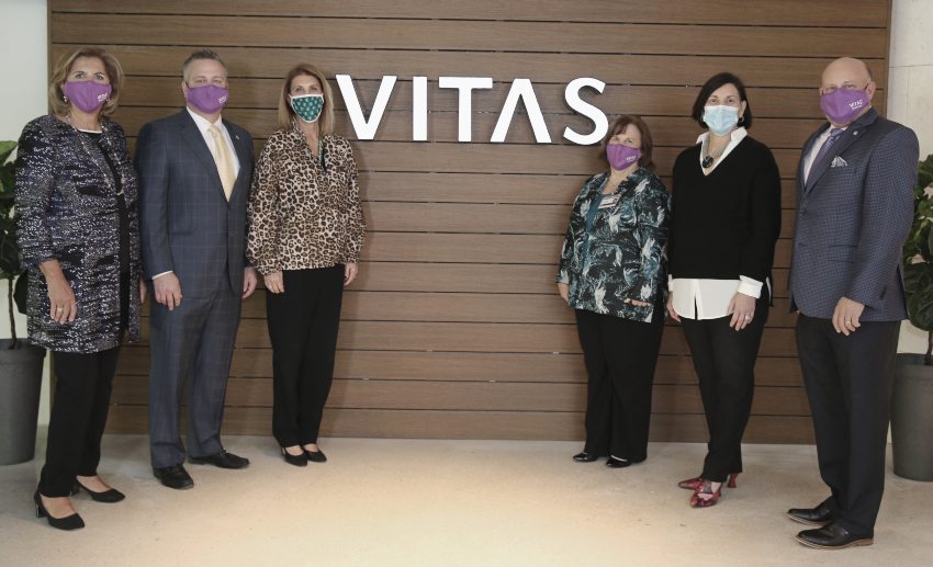 VITAS and Baptist Health leaders gathered for a photo