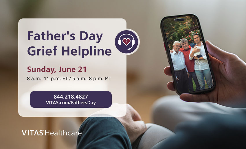 Man with smartphone showing picture of his father along with information about the Fathers Day Grief Helpline