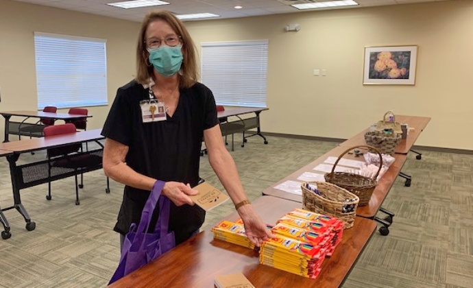  Barbara Bodeep MSW gathers items at one of the Compassion Workshops