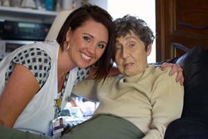 Jena Ruehl, VITAS RN, with a patient