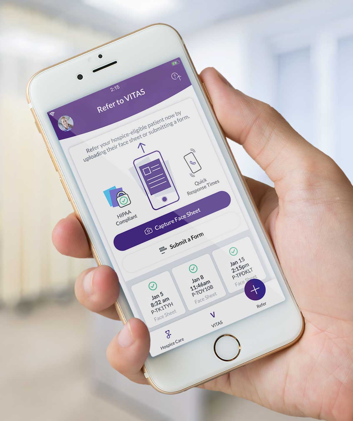Person holds smartphone showing the VITAS app