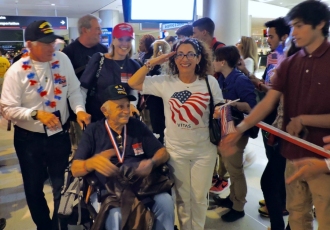 Delighted veterans upon their return from visiting war memorials in Washington, D.C.