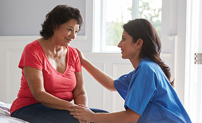 Woman with healthcare professional