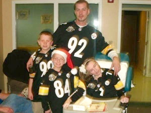 Husband, two kids and wife with Huntington's Disease
