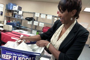 Woman helping with Meals on Wheels