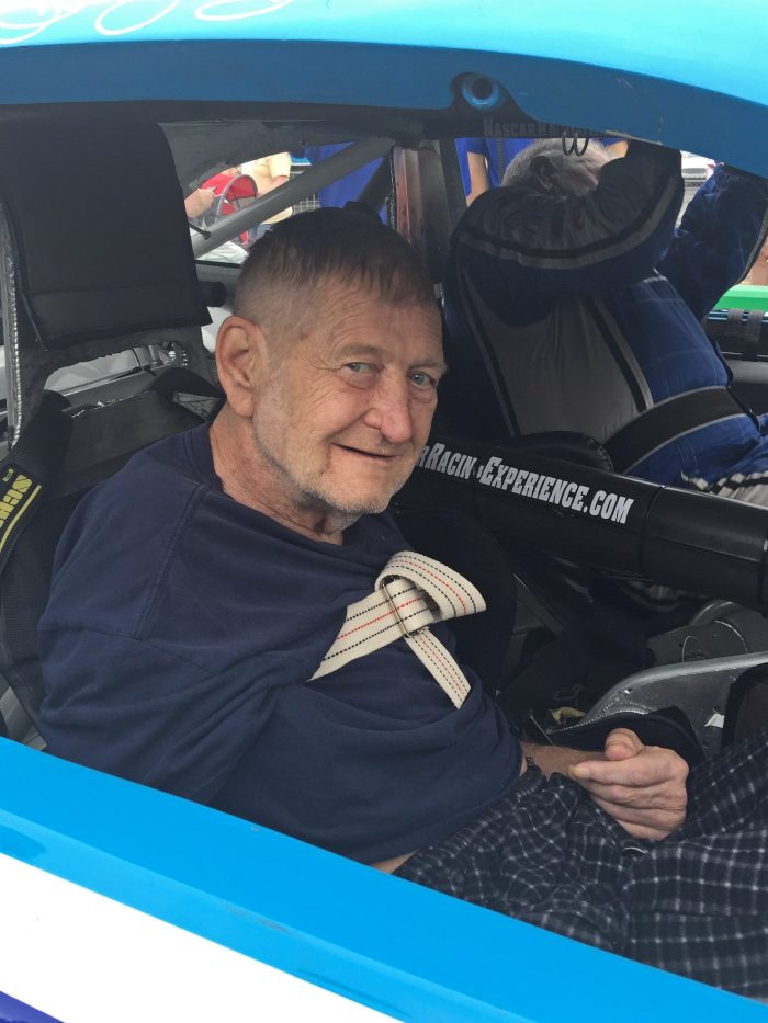 Ronald inside the race car cockpit