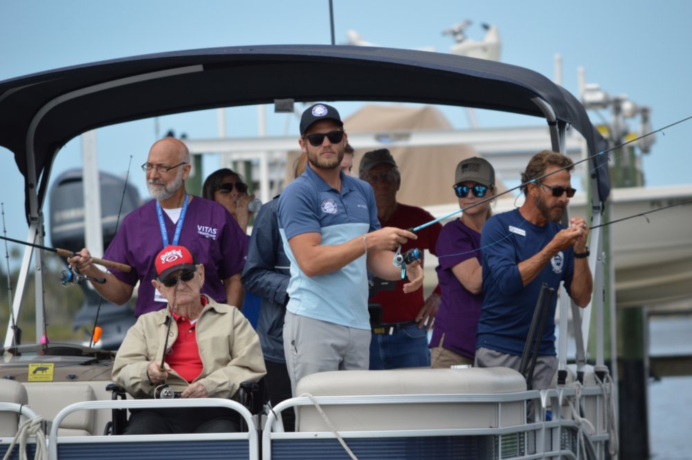 The group aboard the fishing boat included David, his wife and his VITAS team