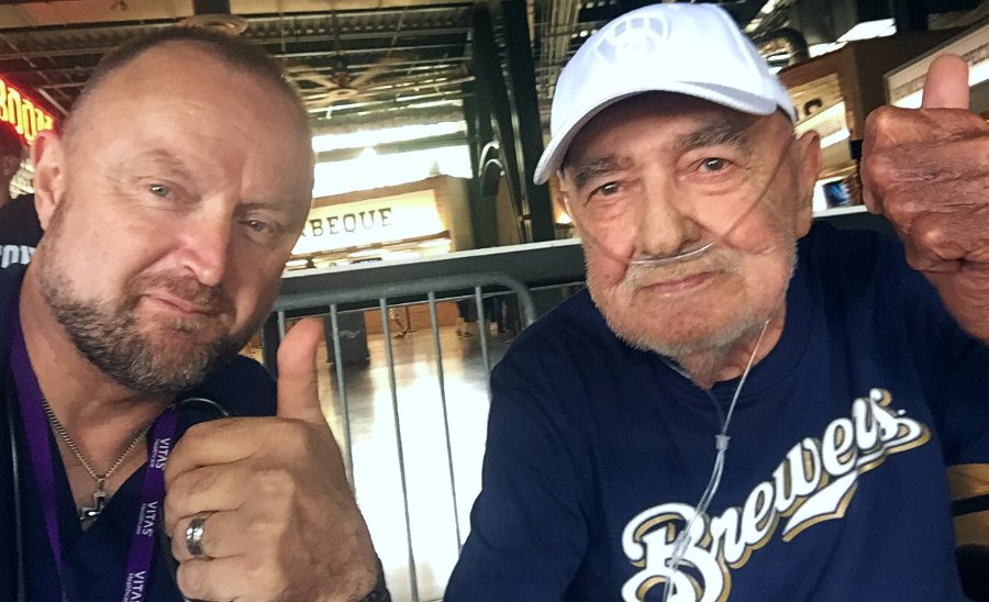 Jeremy and Russell give a thumbs-up at the ballpark