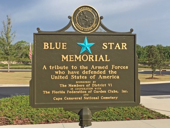 A plaque describing the Blue Star Memorial, "a tribute to the Armed Forces who have defended the United States of America"