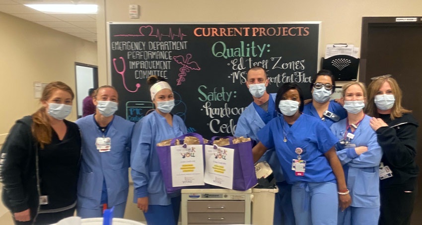 The emergency department staff gather for a photo with the lunch provided