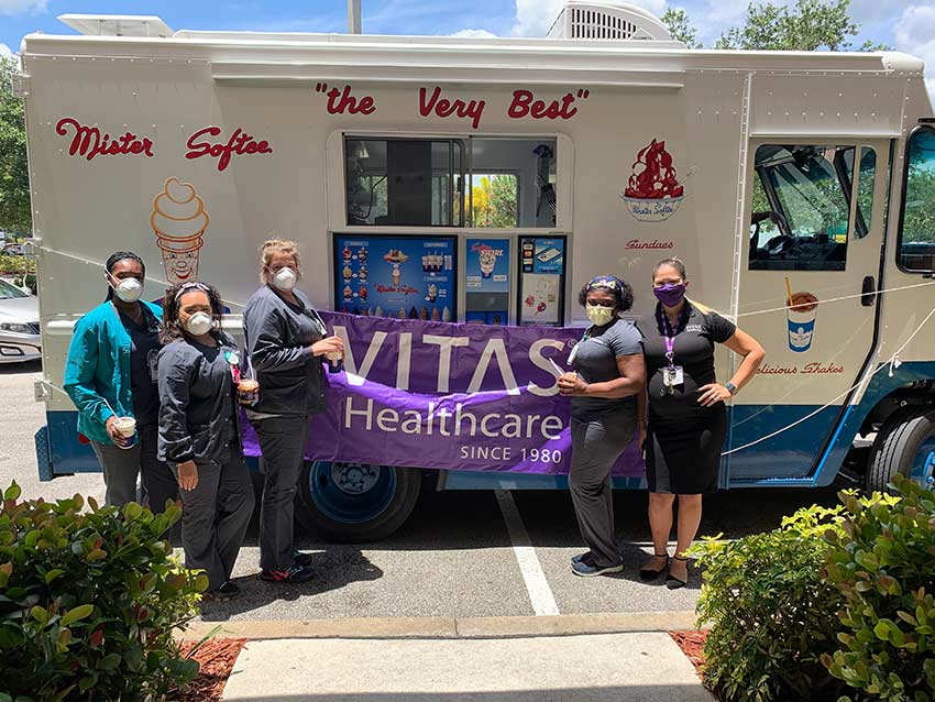 Front-line healthcare workers enjoy treats from the Mister Softee truck