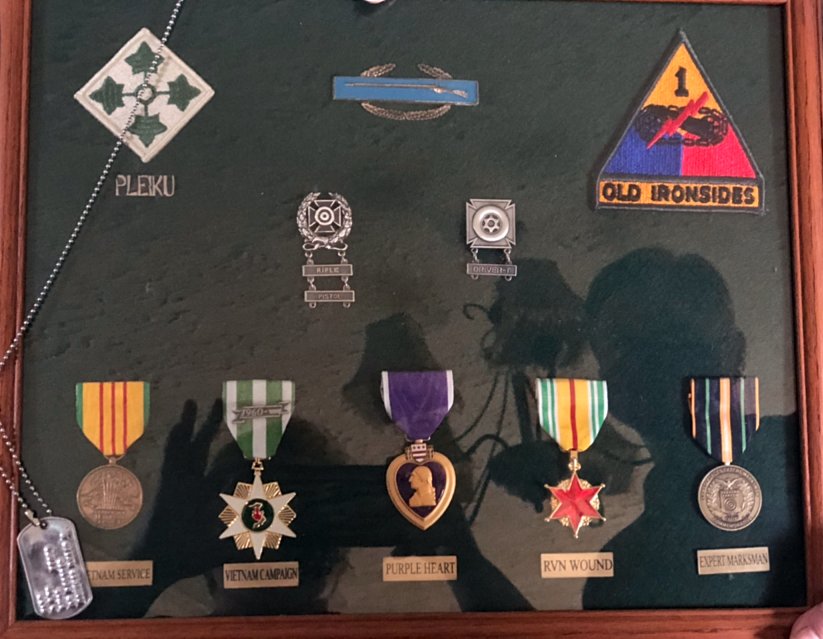 David Cornett's service medals displayed in a framed case