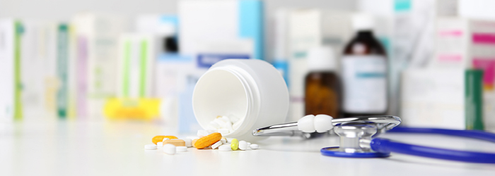Container of pills knocked over