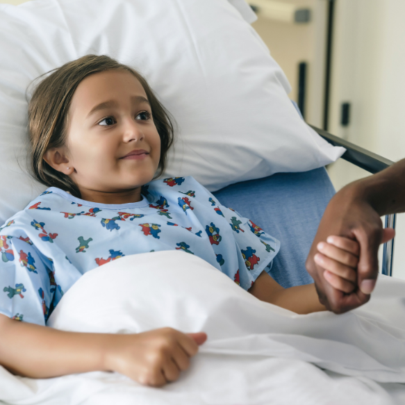 A child in a medical bed